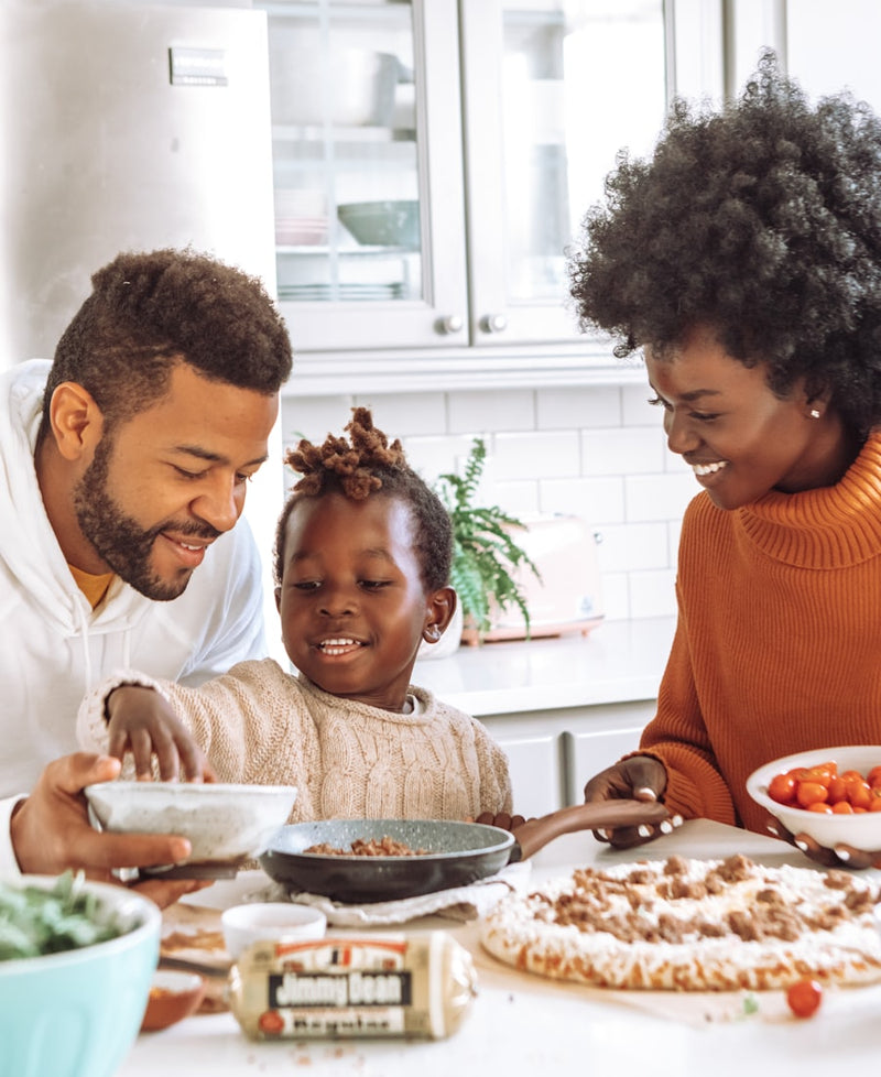 A family making food together in the kitchen